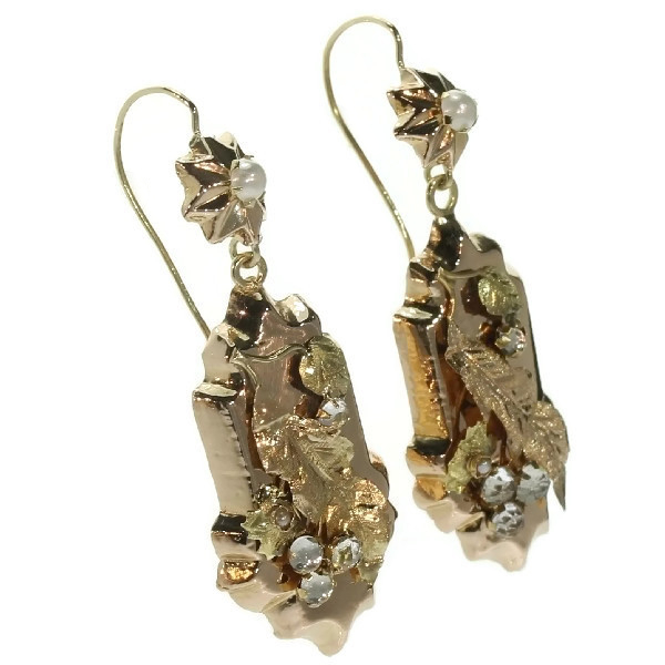 Antique Victorian gold earrings with floral motive